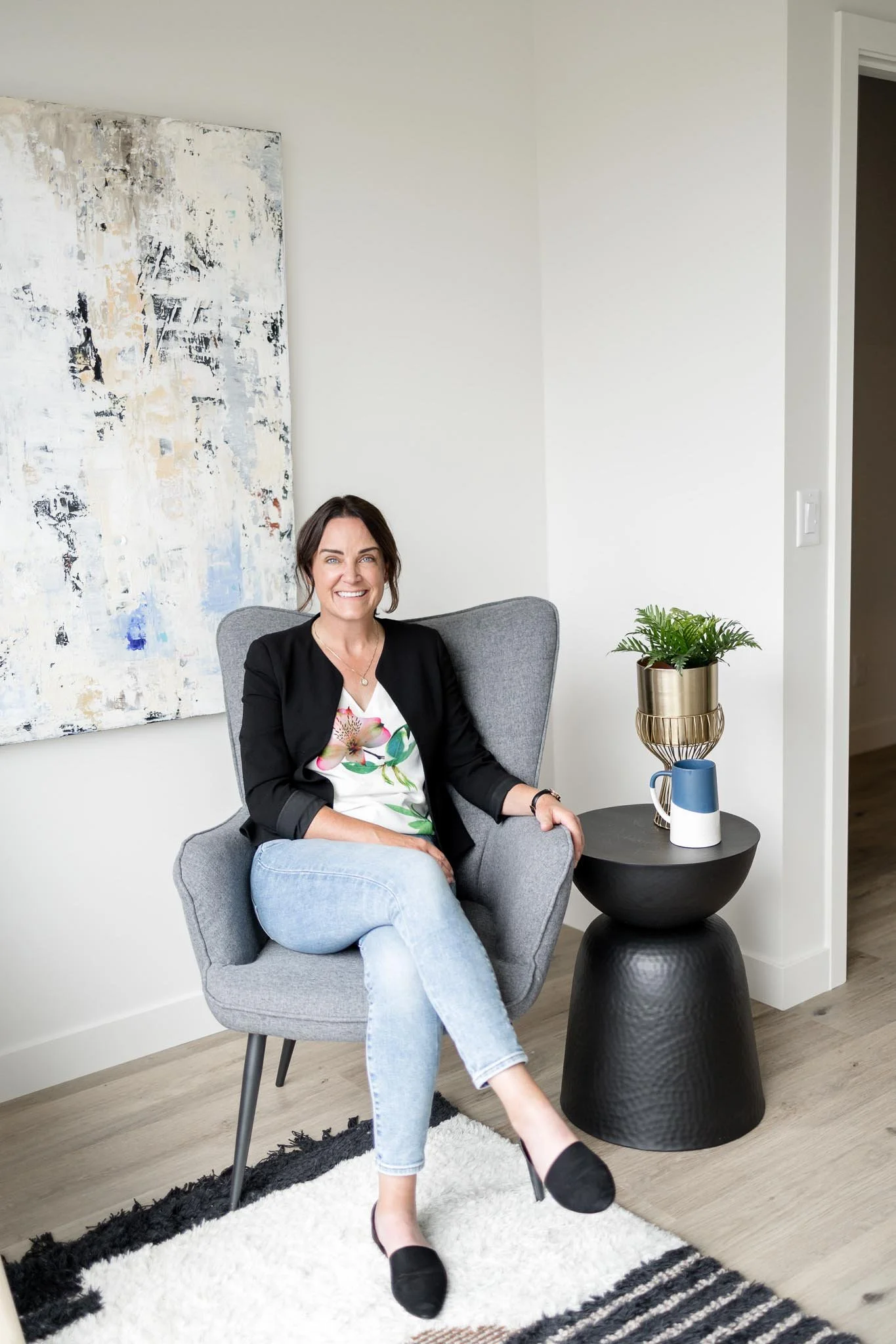 Calgary therapist welcoming clients into a comfortable counselling space