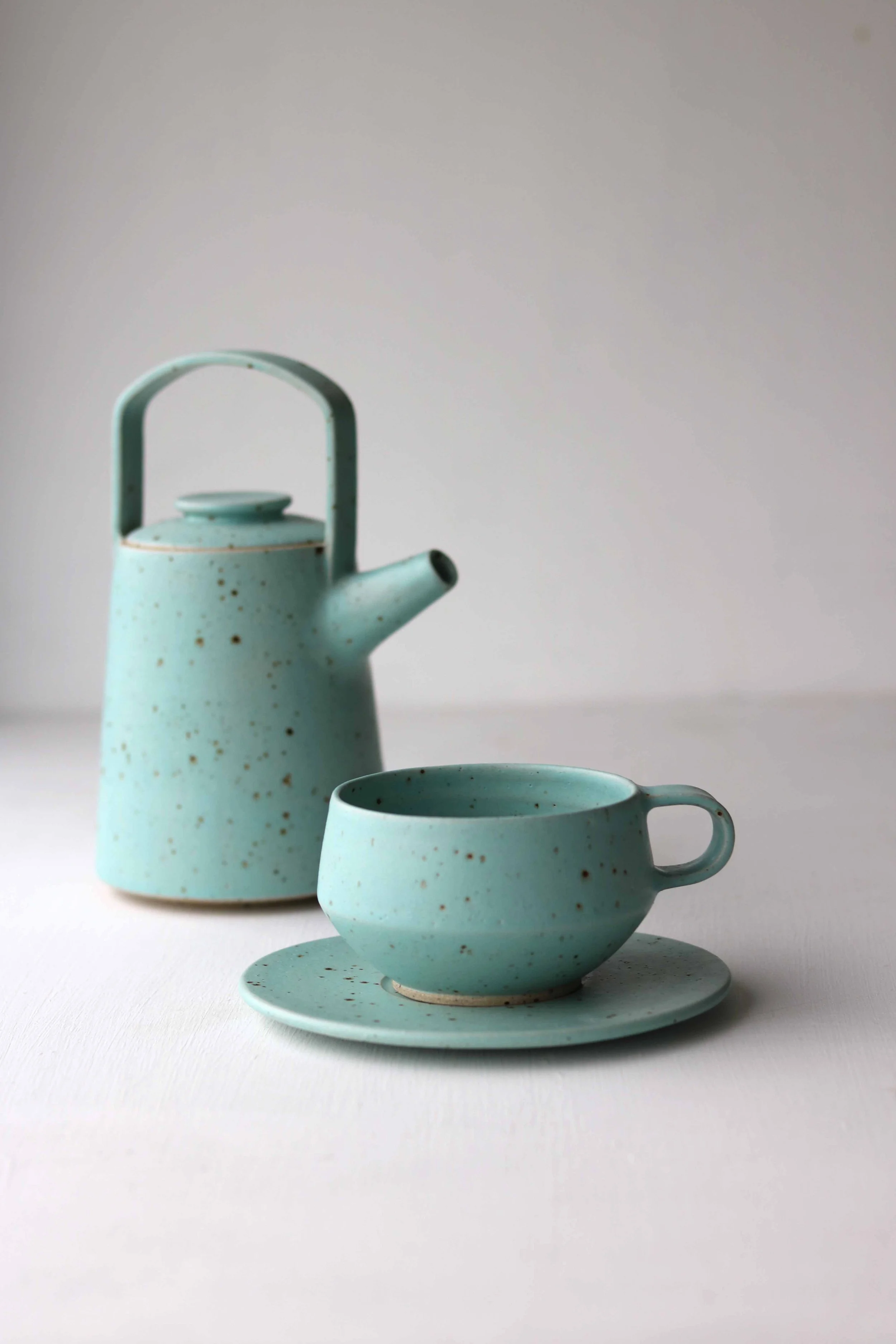 tea cup in seafoam with teapot.jpg