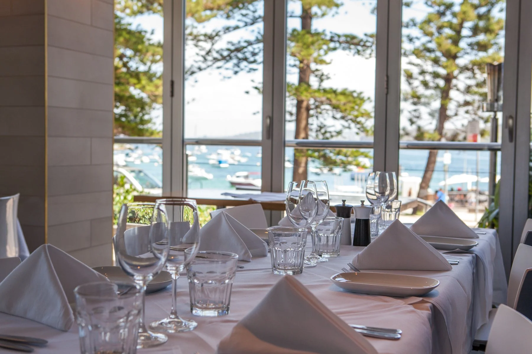 Group dining table in Manly restaurant with waterfront atmosphere