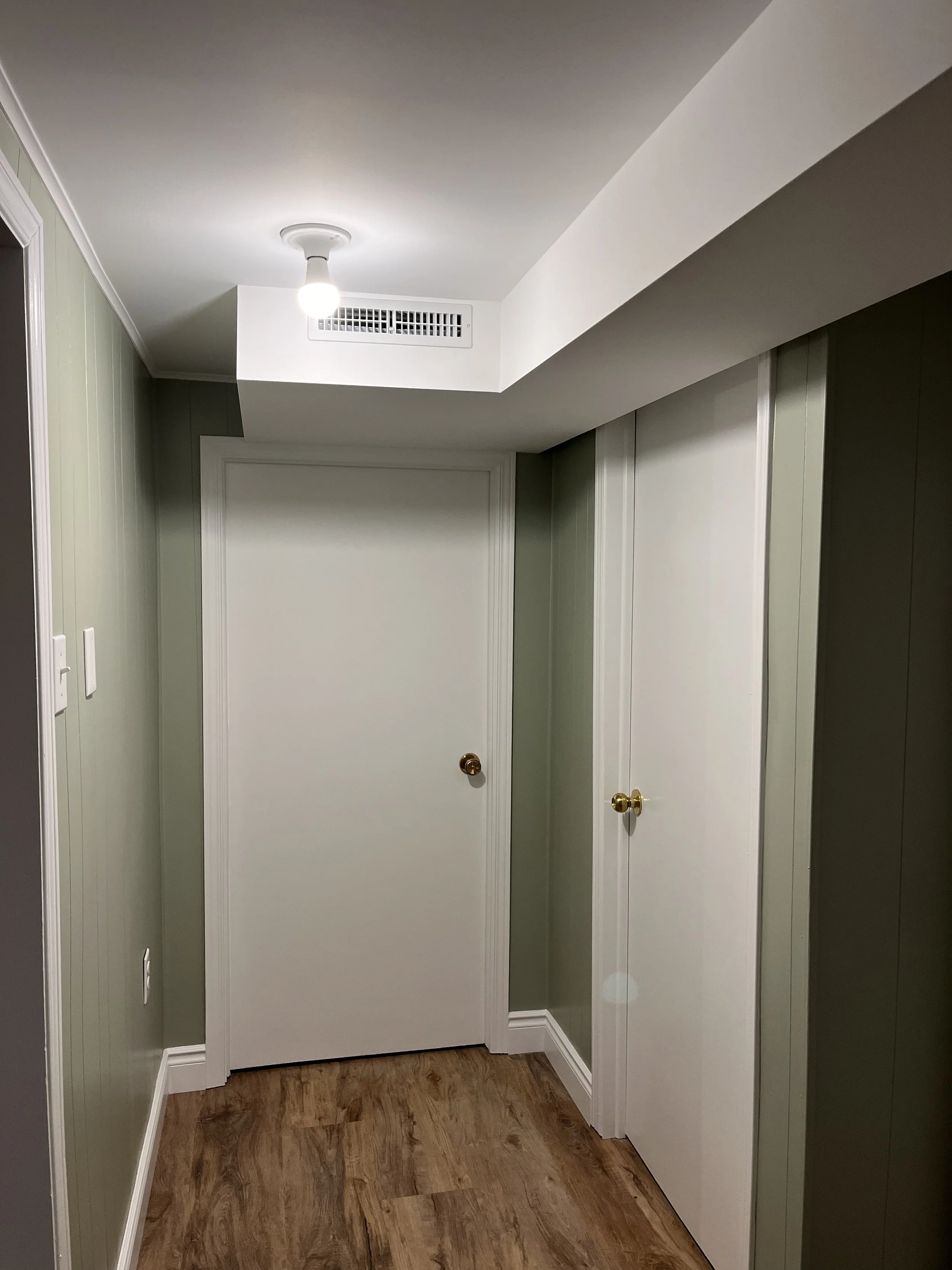 Painting Trim and doors, white bulk heads, framing and drywalling around furnace ducts