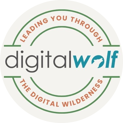 Digital Wolf logo with the text 'Leading You Through the Digital Wilderness' around a circle, and the word 'digital wolf' in the center, with a wolf head on the letter 'w'.