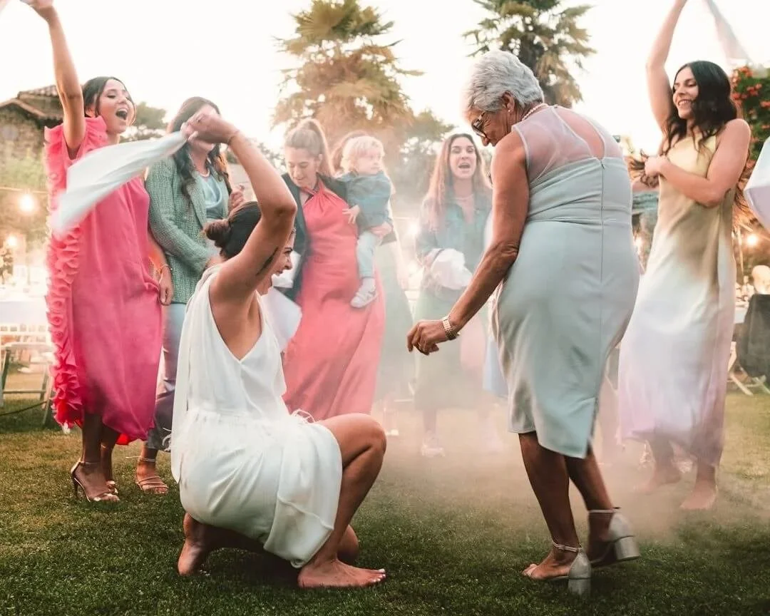 resentment in relationship therapy orange county 7 people 1 baby in half circle dancing in special event attire smiling dancing