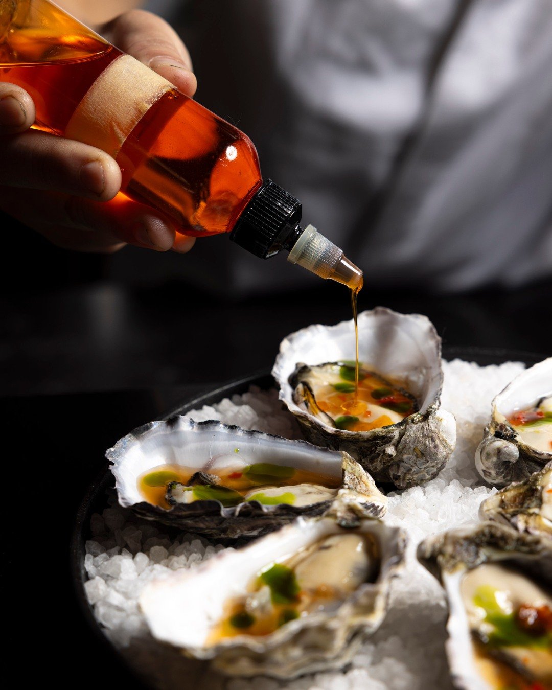 Oysters that know how to make an entrance, our Pacific Oysters are bright, bold, and spiked with spicy nuoc cham.

The tomato essence brings sweetness, while dill oil smooths the finish. It&rsquo;s raw energy, refined. 

One slurp and you&rsquo;ll ge