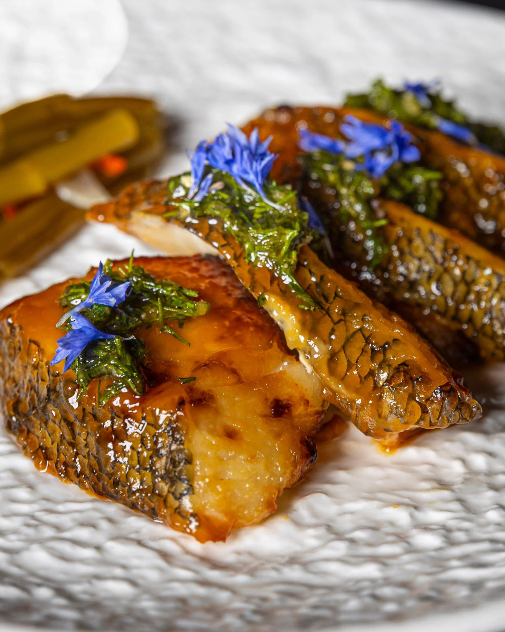Toothfish highlights the depth of the Grand Table menu.

Glazed with lemongrass miso and finished with dill miso relish and pickled morning glory, the dish balances richness with bright, aromatic notes. 

It forms part of Kaiza Grand Table, a $120pp 