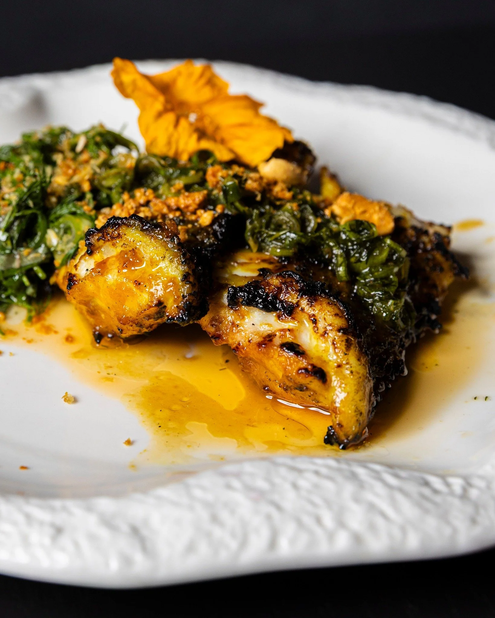Grilled grouper brings two influences onto one plate.

The fish is handled with Japanese precision to preserve its clean texture, then layered with Vietnamese elements that add brightness and depth without overpowering it. It reflects how Kaiza bring