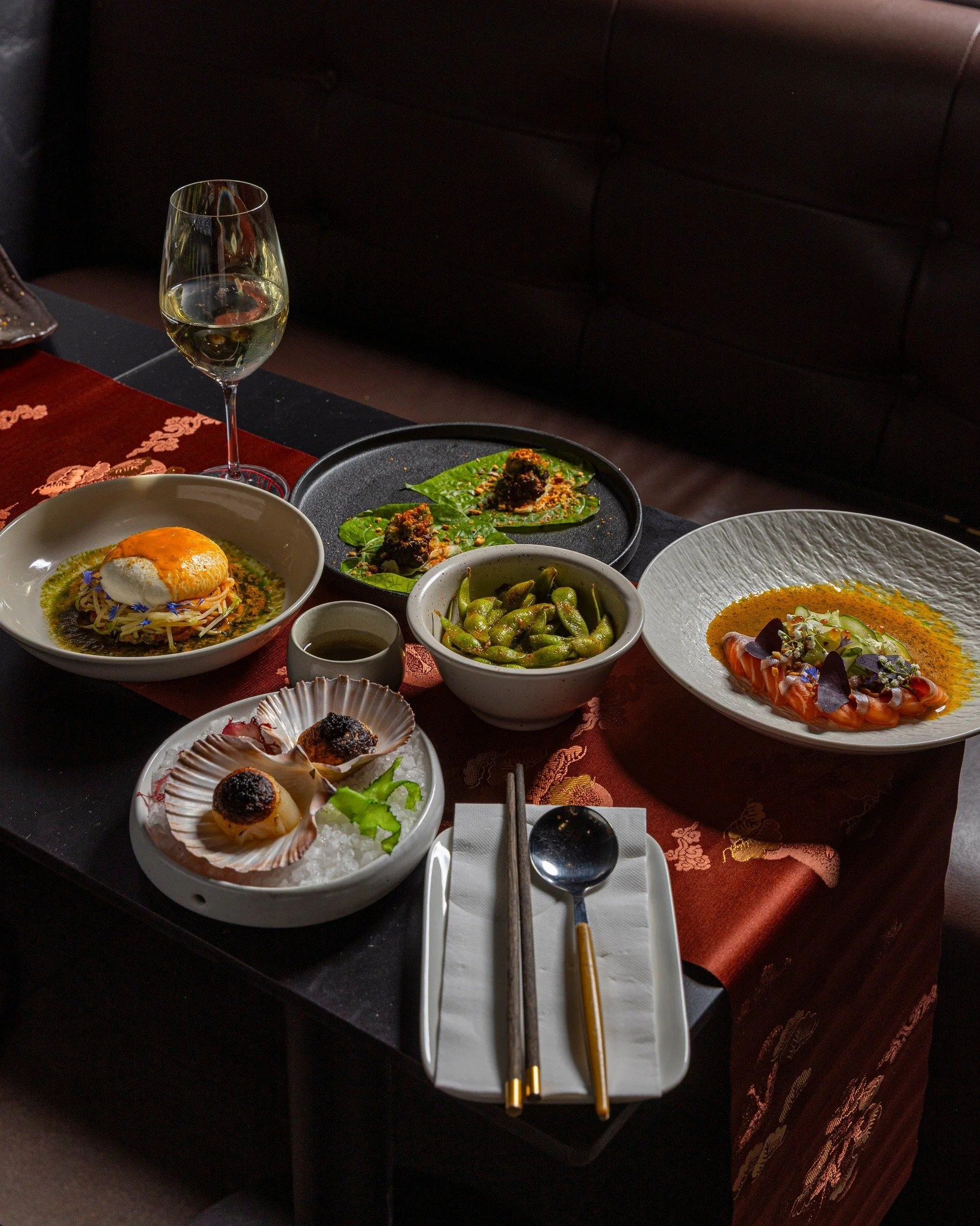 A full spread shows how the Kaiza menu is meant to unfold.

Hokkaido scallops, burrata, wagyu intercostal, TAS salmon, and edamame come together across Kaiza Voyage, a $95pp multi-course set that moves through seafood, grilled dishes, and layered fla