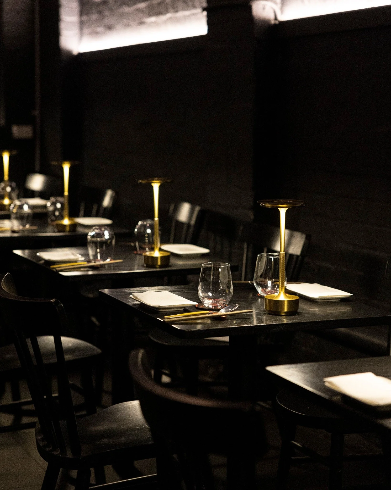 Some tables are designed for smaller, more personal moments.

Kaiza is closed on Mondays, but the indoor space is built for intimate occasions once service resumes, with seating, lighting, and layout suited to slower meals and shared dishes in Newtow