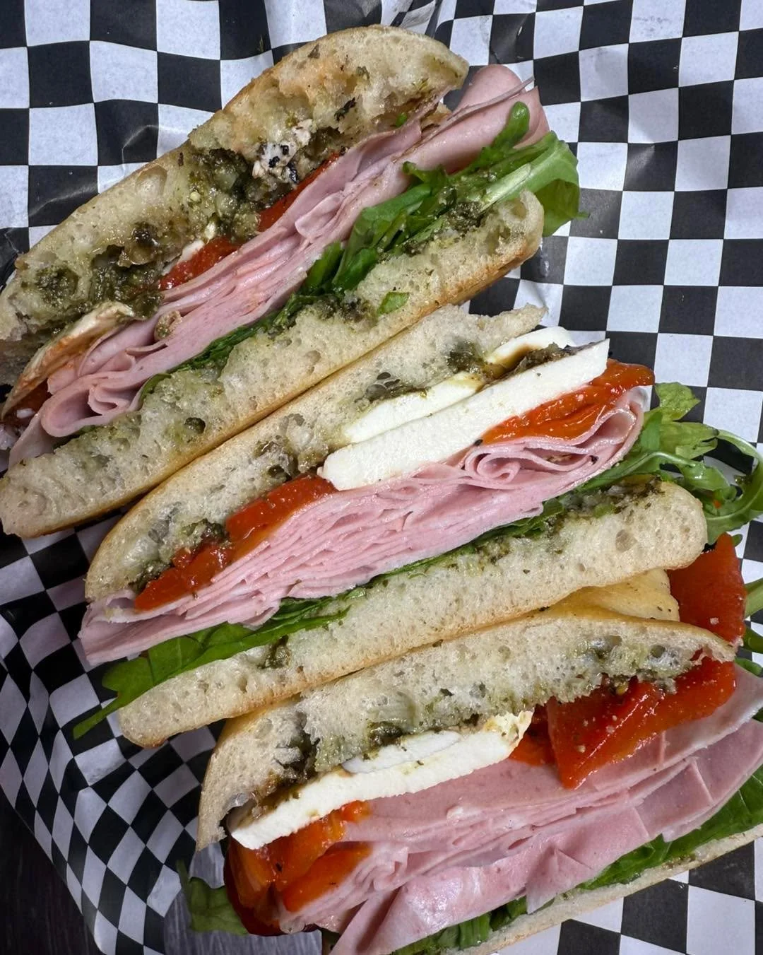 New Year, new bae on the roster ✨ 

Introducing our mortadella sandwich:

Freshly sliced mortadella, fresh mozzarella, marinated roasted red peppers, arugula, balsamic glaze &amp; fresh pesto between herbed focaccia 👌🏾 

Available in platters or ou