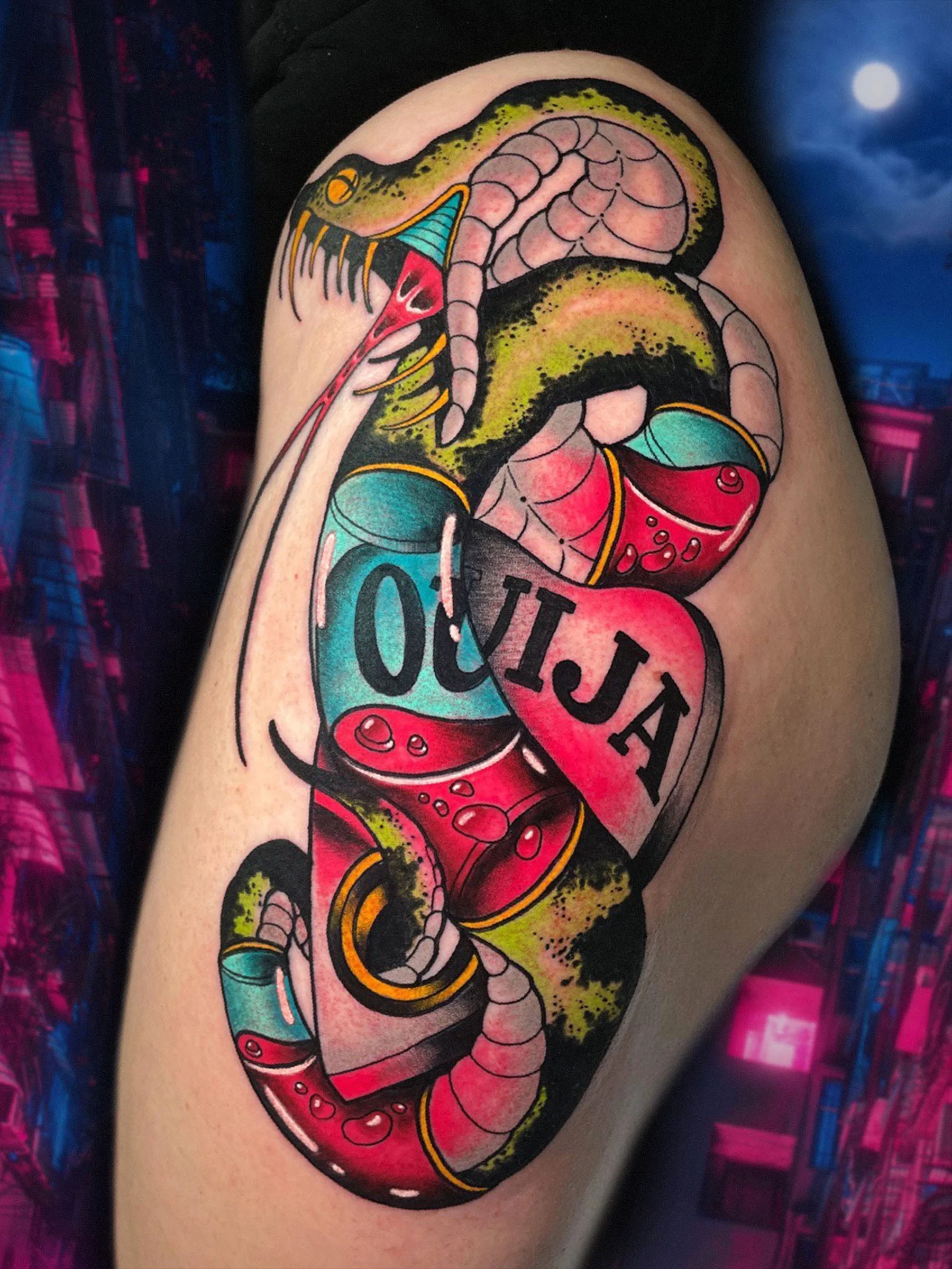 Cyber glass snake and Ouija board neo traditional tattoo by Evansville Indiana tattoo artist Shane Klos