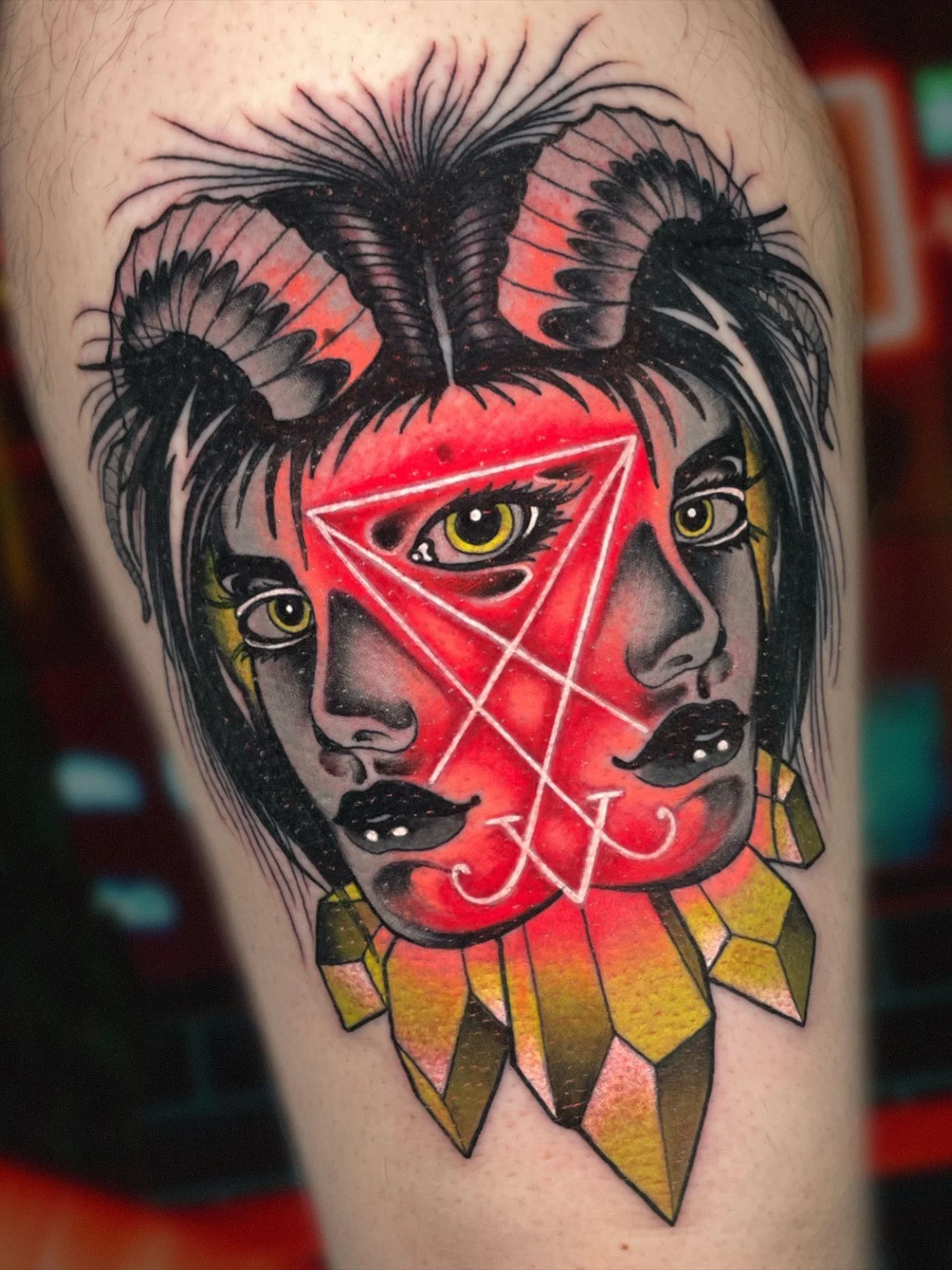 Occult twin face tattoo with ritual symbolism and bold red accents, tattooed by Shane Klos in Evansville, Indiana.