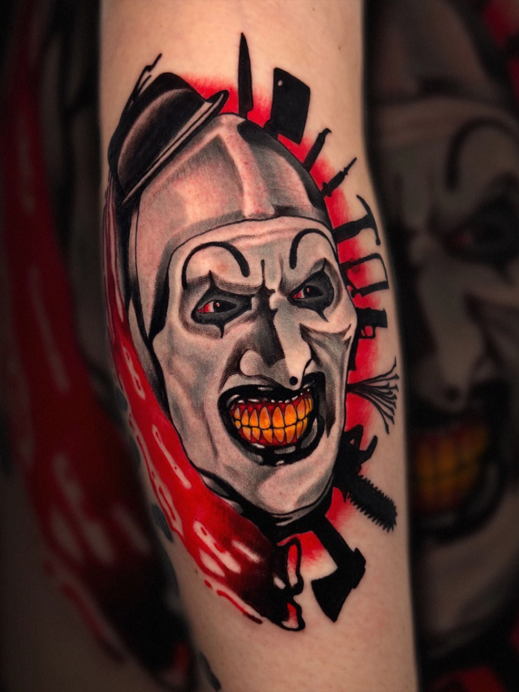 Neo traditional horror face tattoo inspired by Terrifier by Shane Klos in Evansville, Indiana