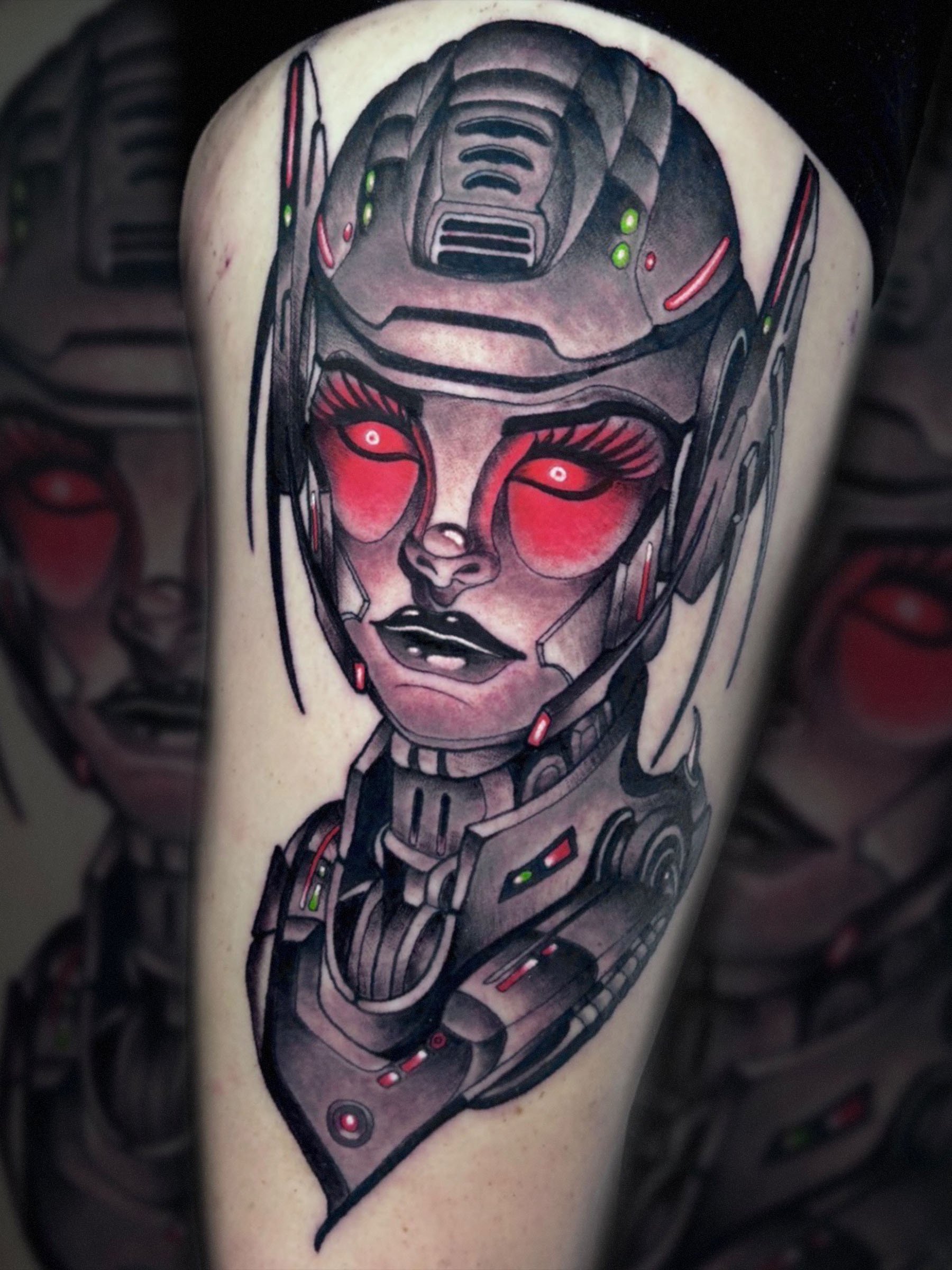 Cyber female android portrait tattoo with red eyes by Shane Klos in Evansville, Indiana