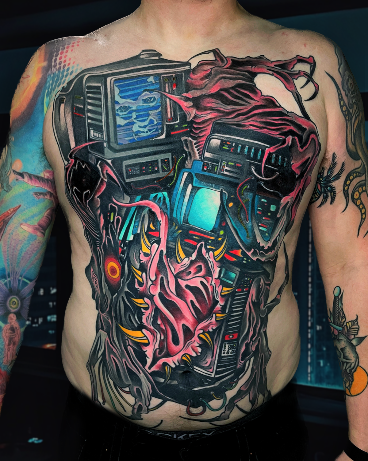 Large custom cyberpunk biomech chest tattoo by Evansville tattoo artist Shane Klos, neo-traditional color realism design in Evansville, IN by Shane Klos