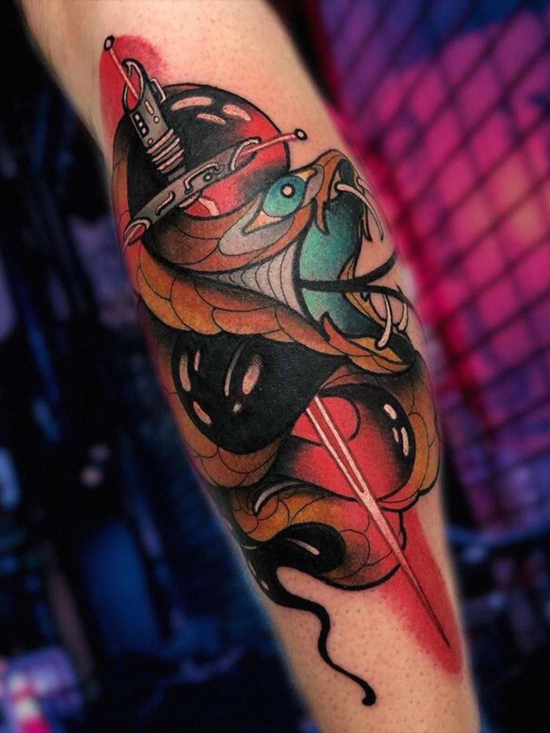 Neon-style sword and snake tattoo with cyberpunk color accents, neo-traditional tattoo by Shane Klos in Evansville.