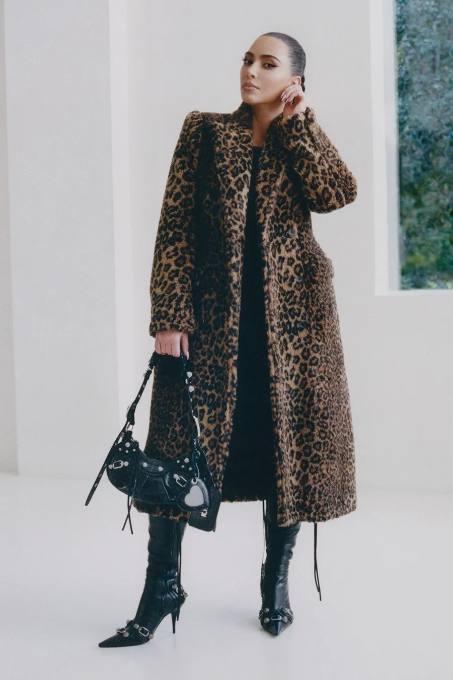 kim-kardashian-for-the-new-balenciaga-campaign,-wearing-a-leopard-print-jacket.jpg