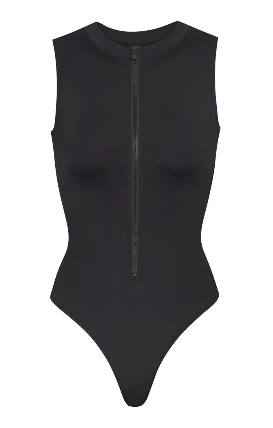 black-skims-swim-suit-is-perfect-for-summer-2024-for-your-next-holiday-zip-up.jpg