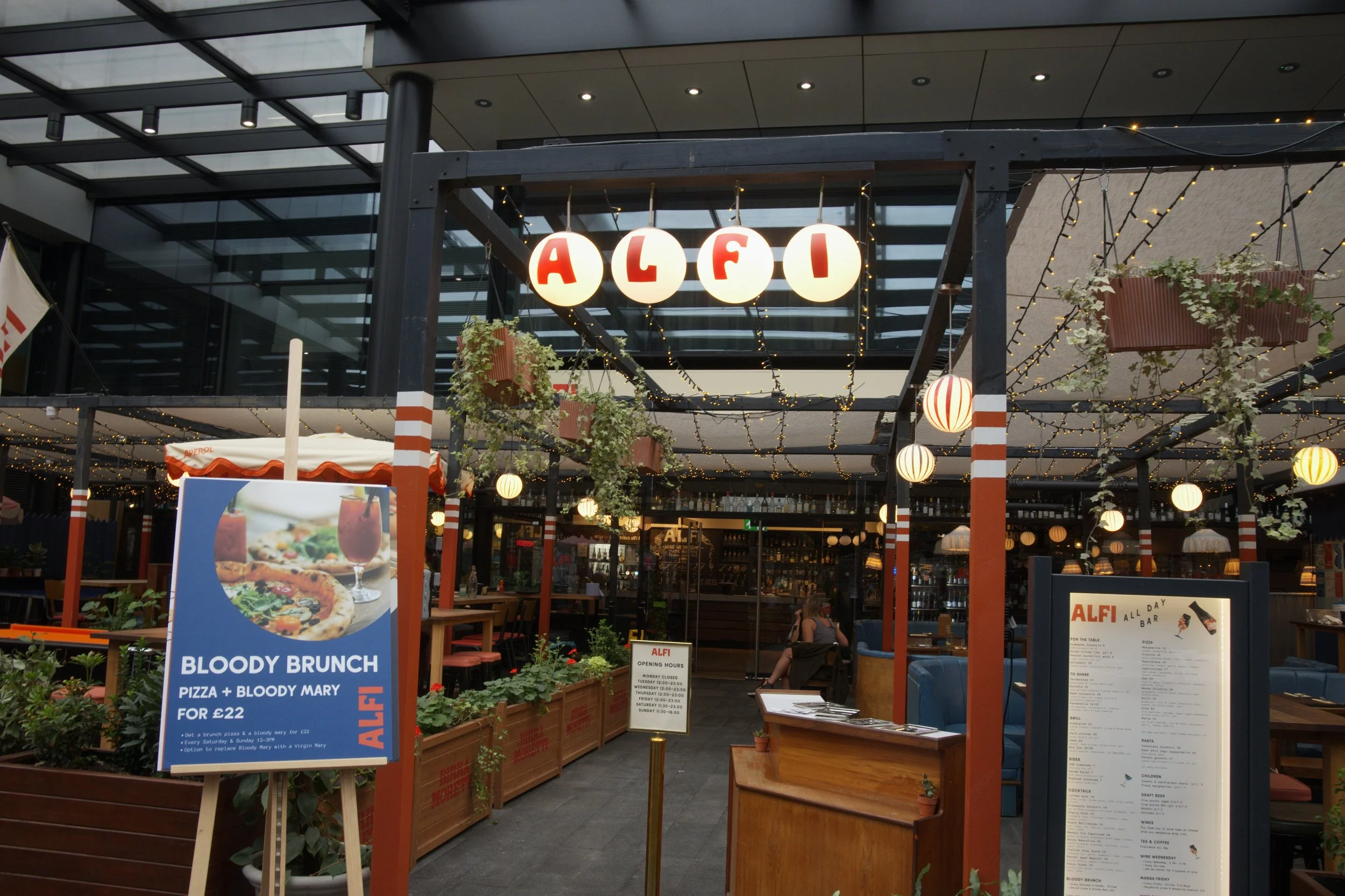 An exterior shot of the Alfi restaurant located in Spitalfields Market, London