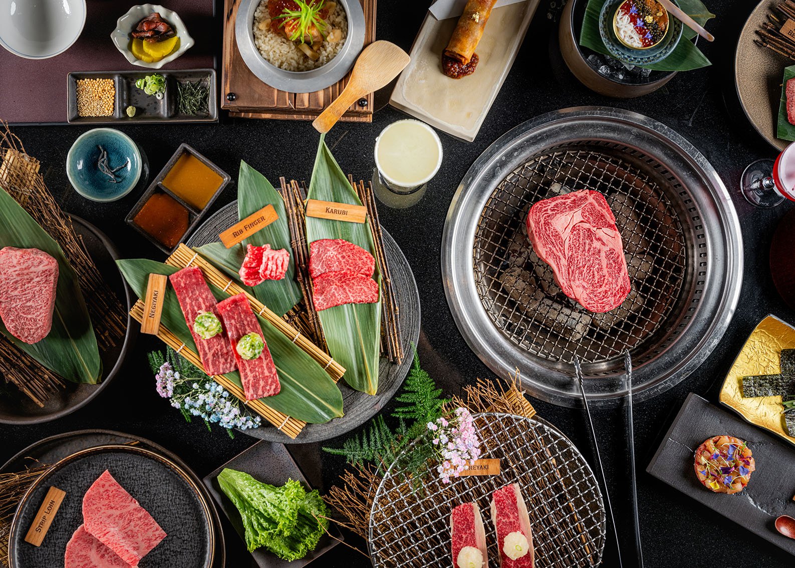 Kanpai Classic Soho - full table featuring premium Wagyu beef cuts