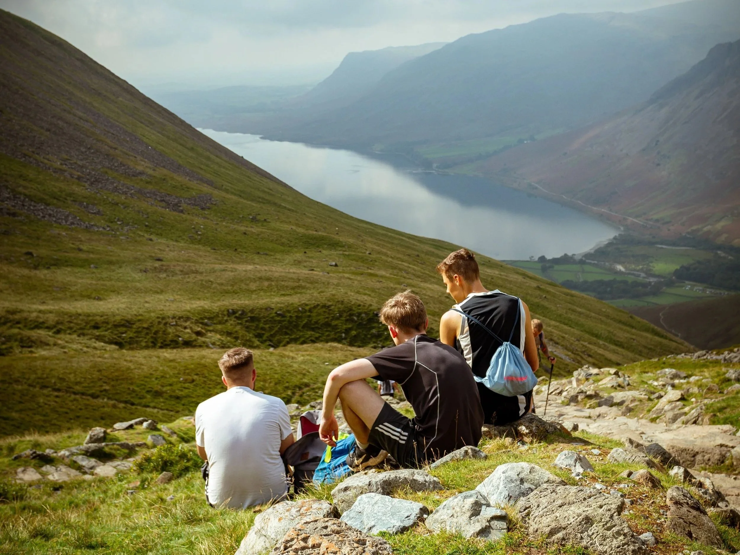 boys sat on lake district fell