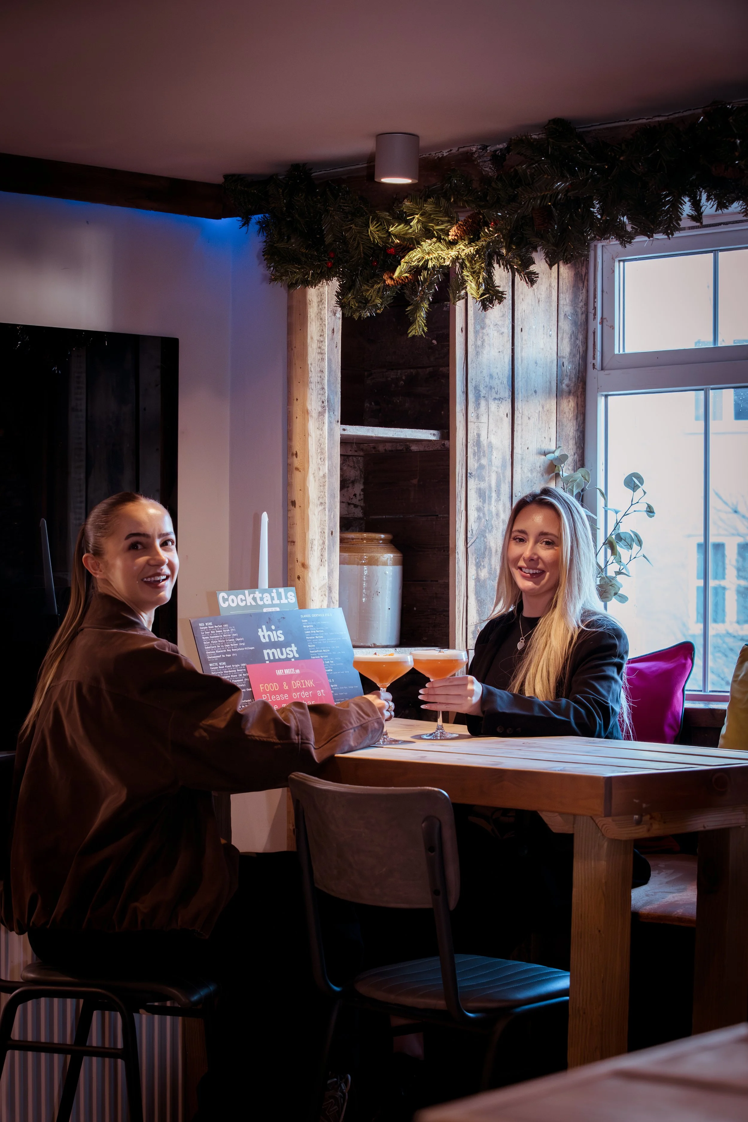 girls enjoying drinks in the easy breeze