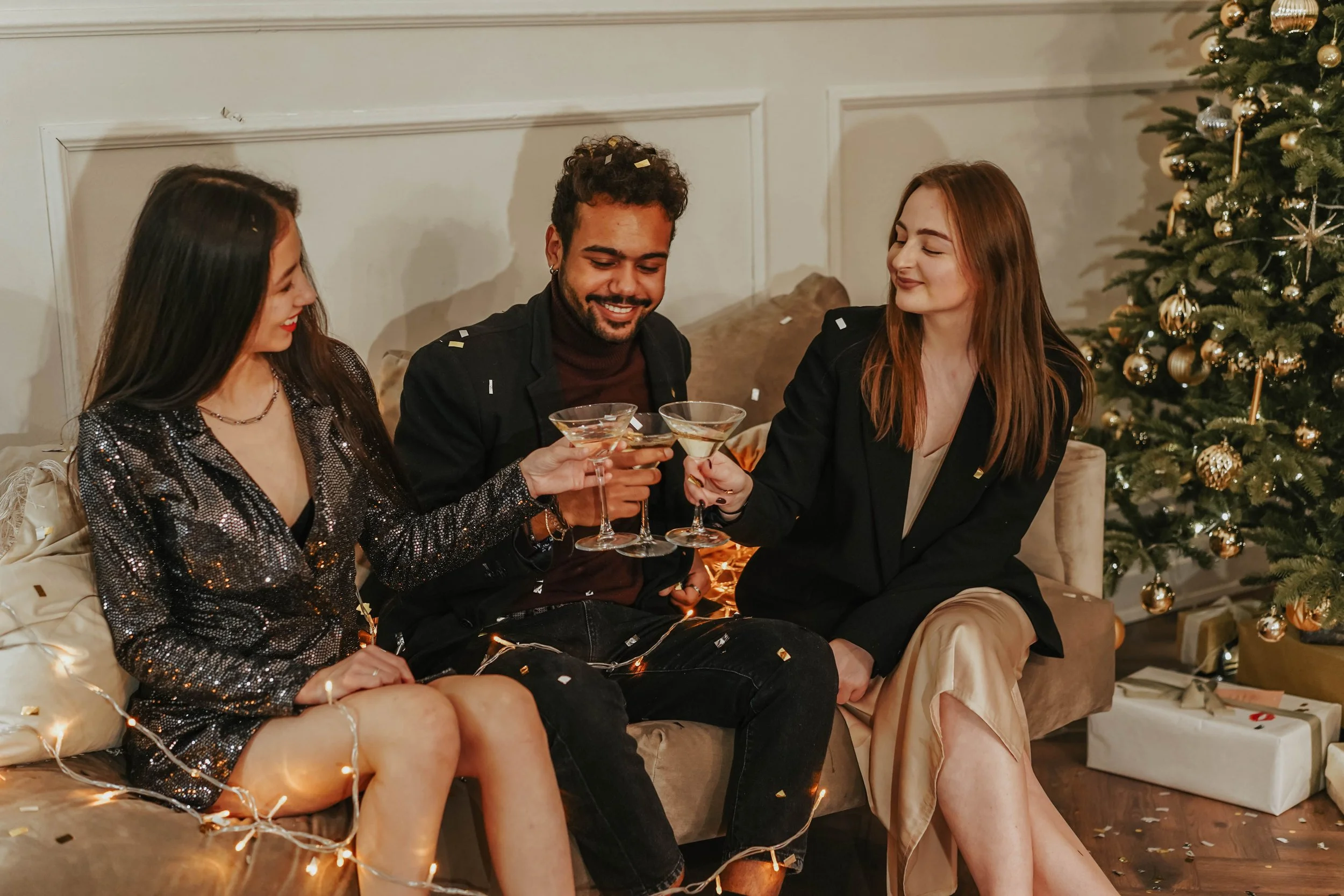 people enjoying drinks at a christmas party