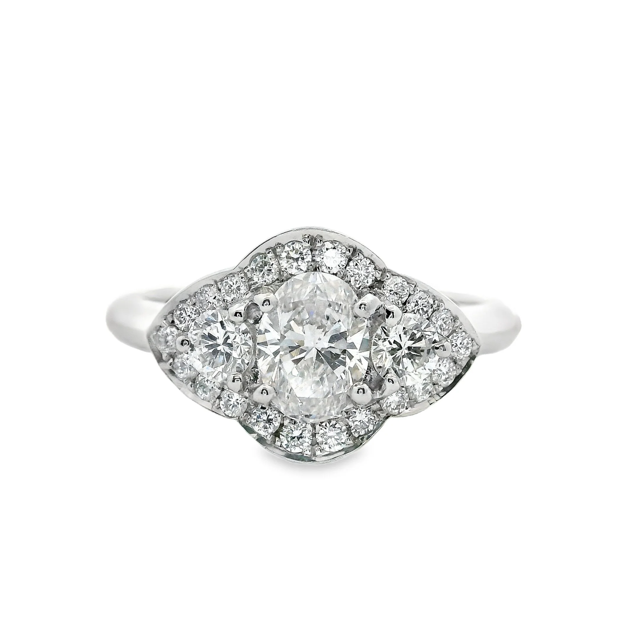 Platinum Claw Set Diamond 3 Stone Halo Ring