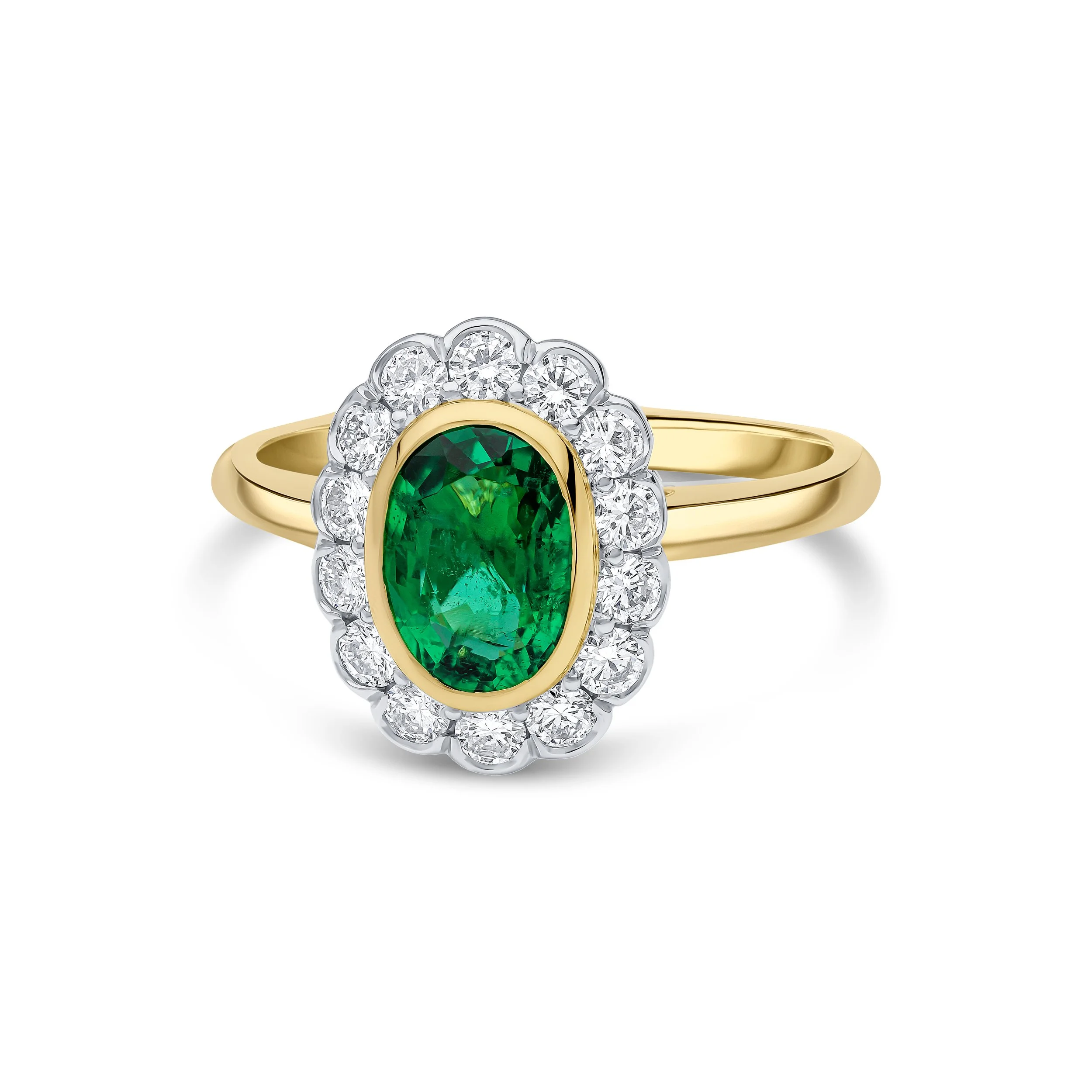 Gold ring with an oval green gemstone surrounded by small clear diamonds.