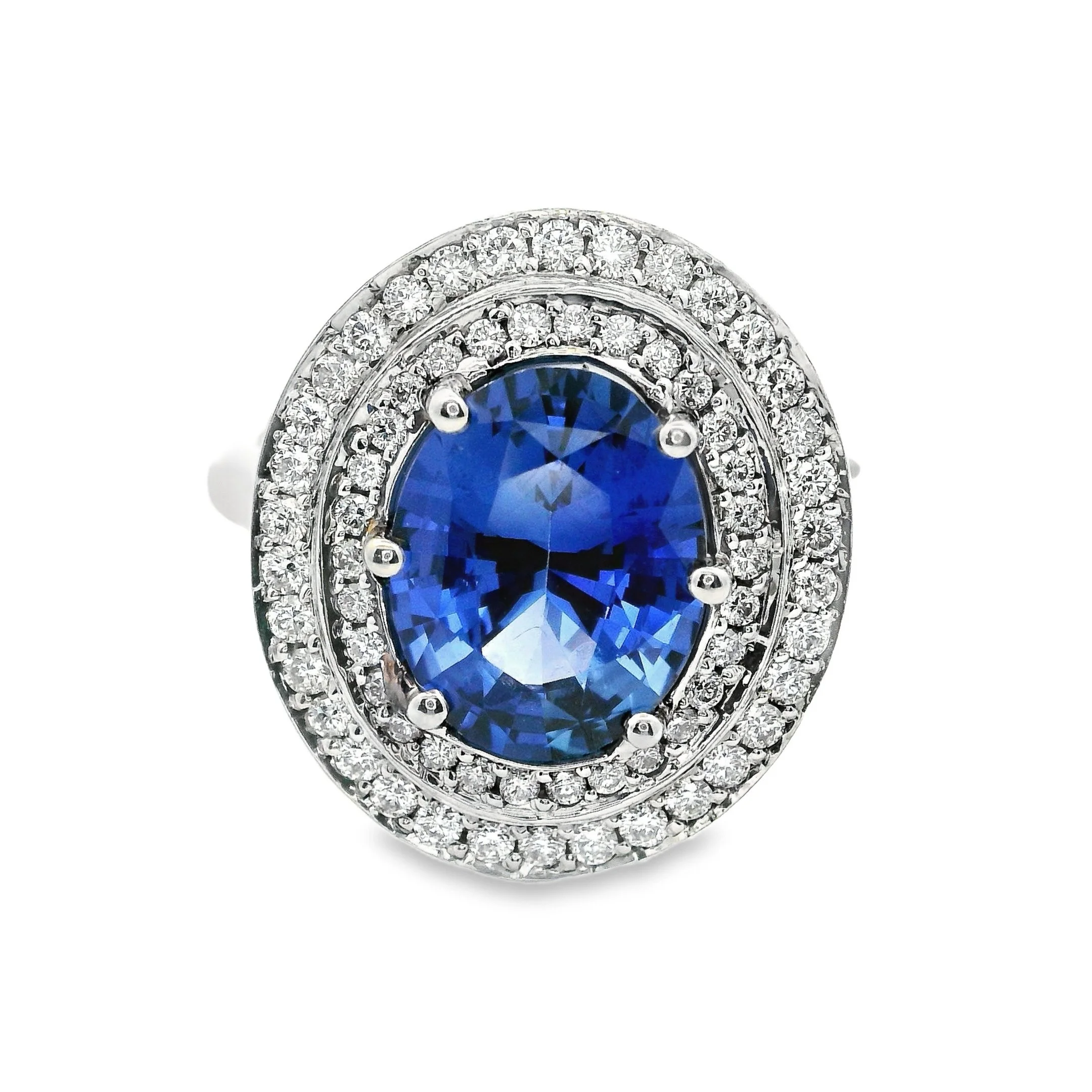 Platinum Claw Set Oval Sapphire & Diamond Double Halo Ring