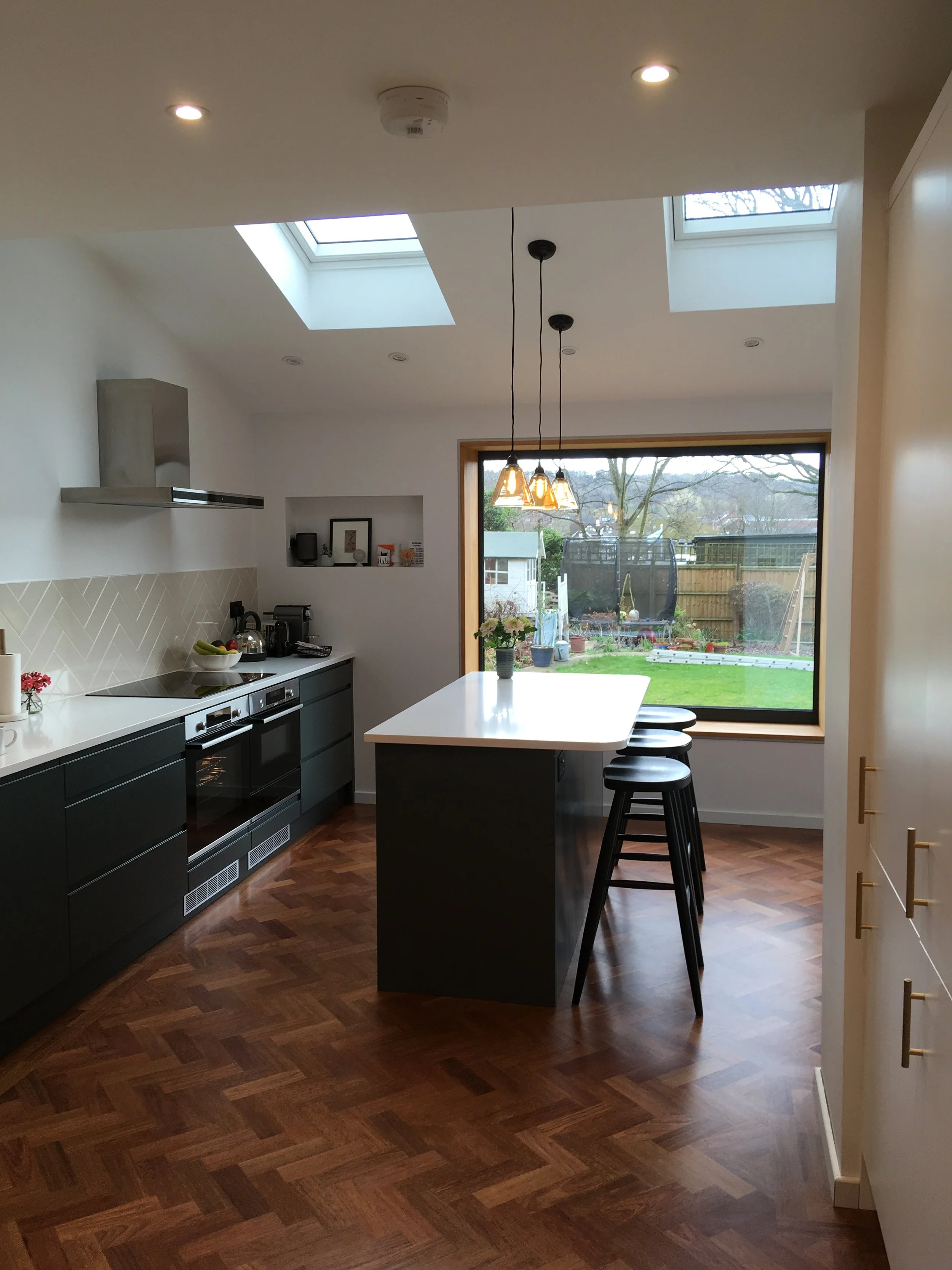 The kitchen was long and thin so a picture window was added.