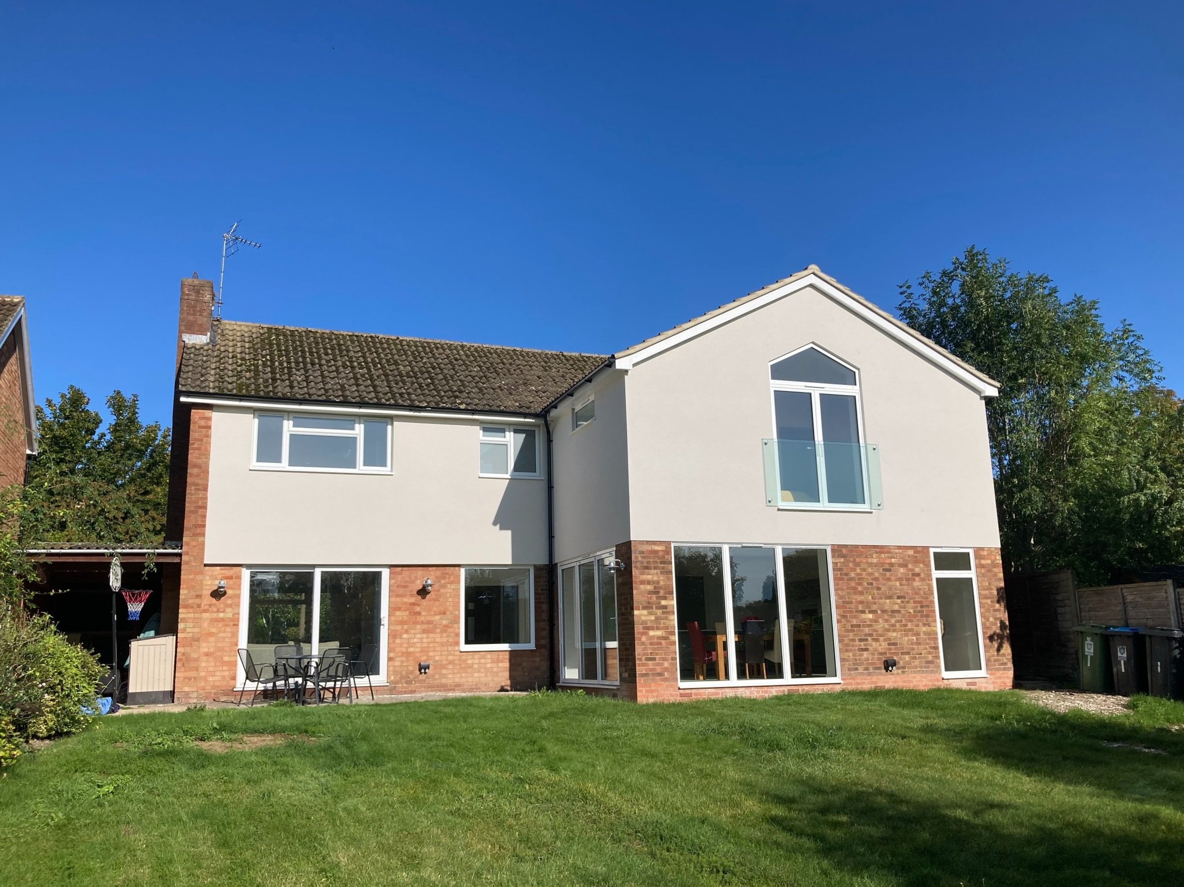 After - large kitchen/ dining space. 5 bedrooms, a family bathroom and an ensuite added.