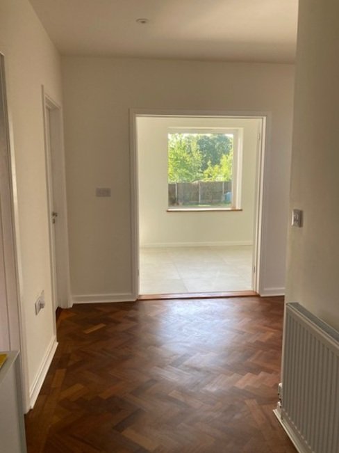 View through to the garden on entering the property which make the hallway inviting and bright.