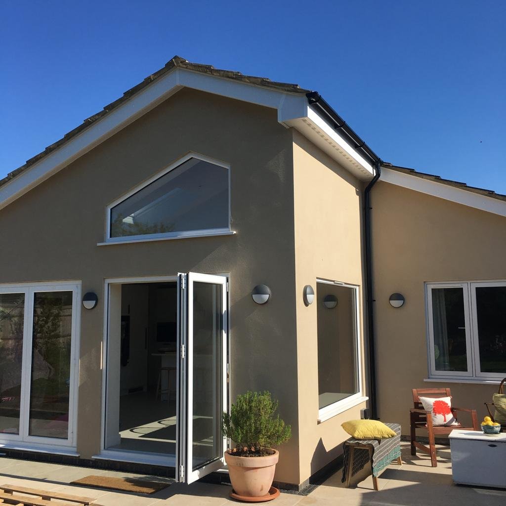 After - double height space created at the by extending and vaulting the ceiling up to the existing roof level.