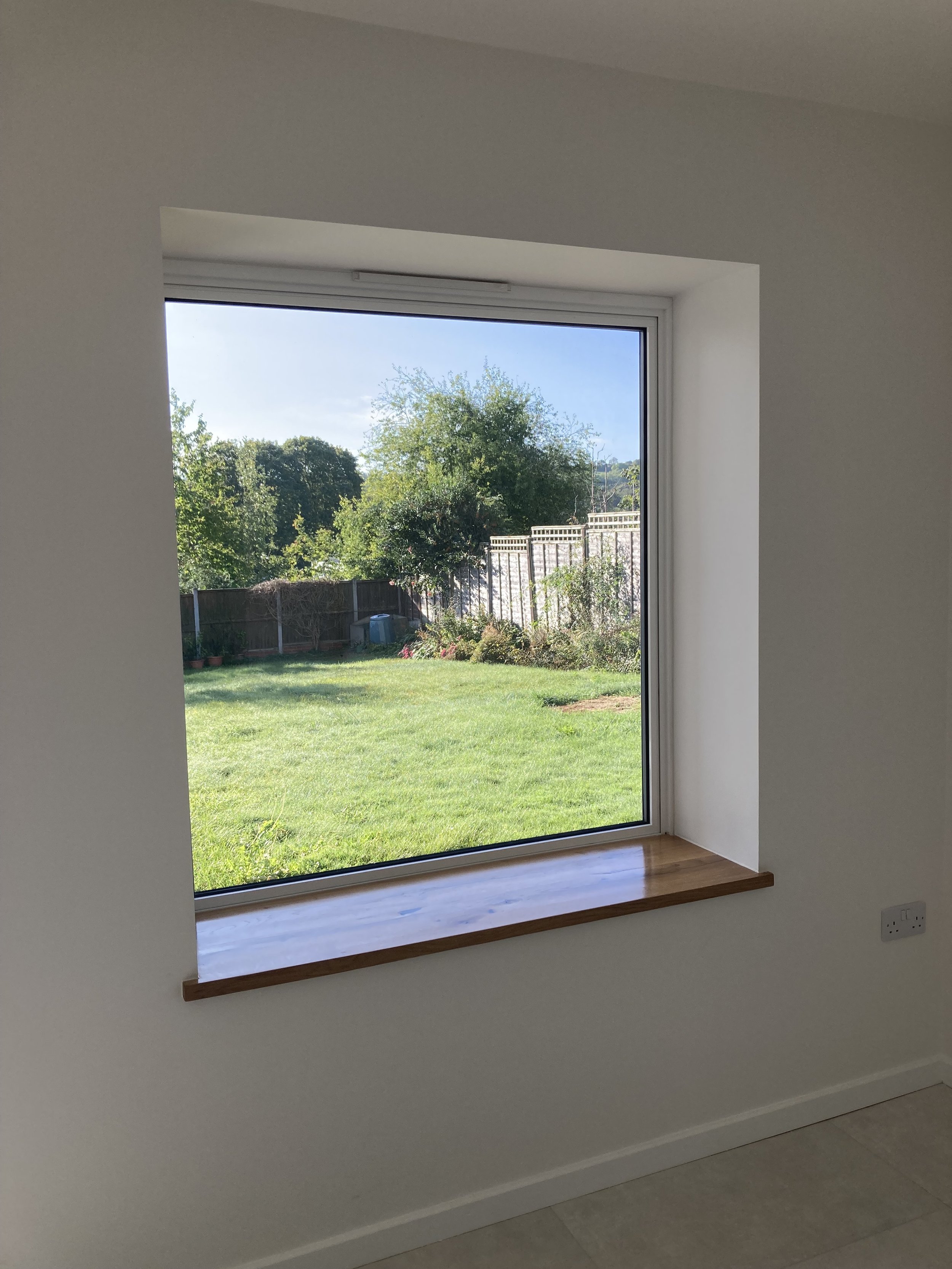 Added a view through to the garden on entering the property, creating light.