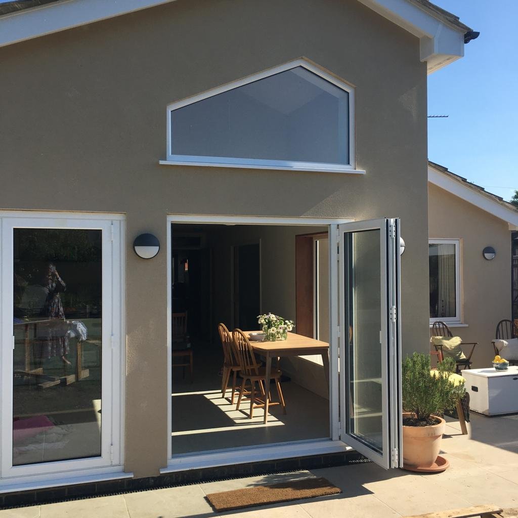 Glazing to maximise the light coming into the rear spaces.