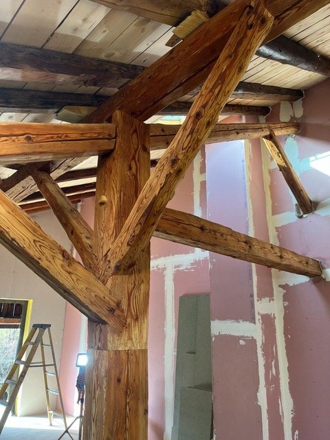 Original wooden beams retained the historic feel of the chalet.