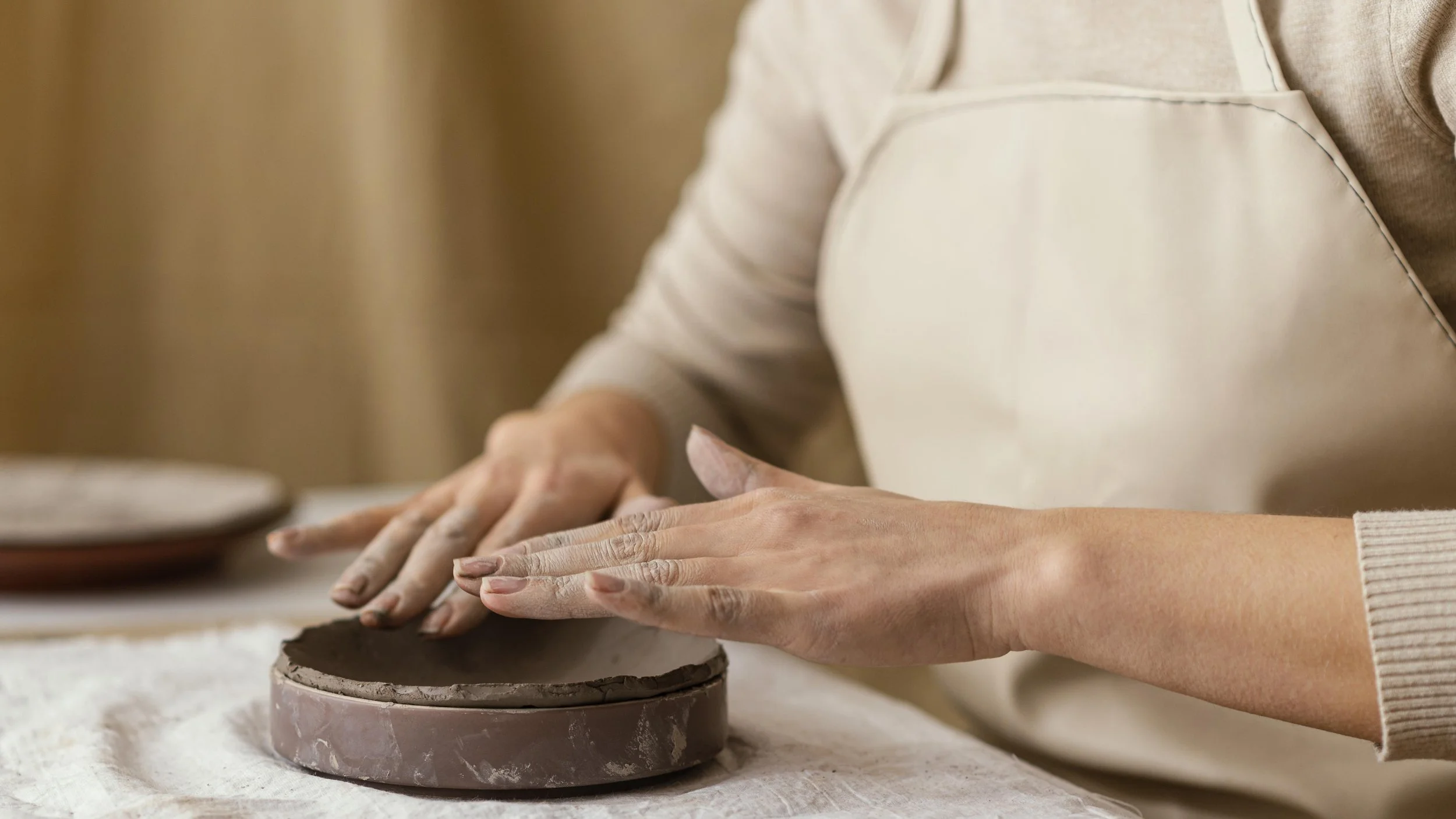close-up-hands-doing-pottery.jpg
