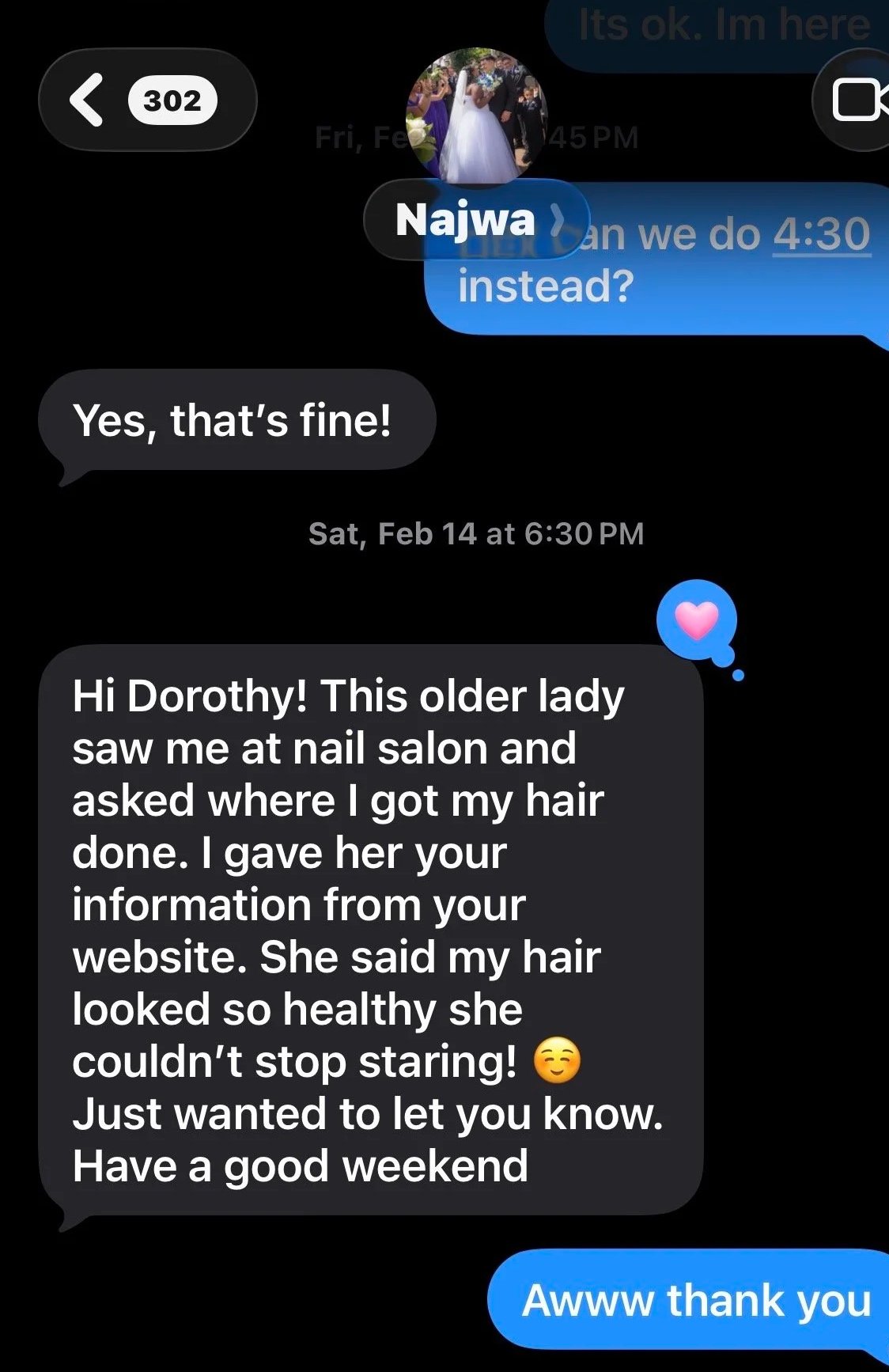 Screenshot of a text message conversation, including a photo of a bride and groom at their wedding, and a lengthy message about a hair salon visit.