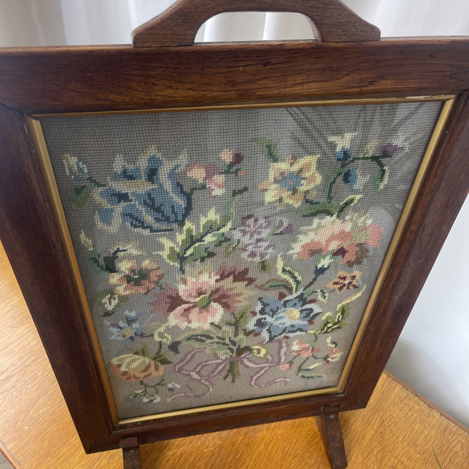 Fire guard with vintage cross stitch flower design