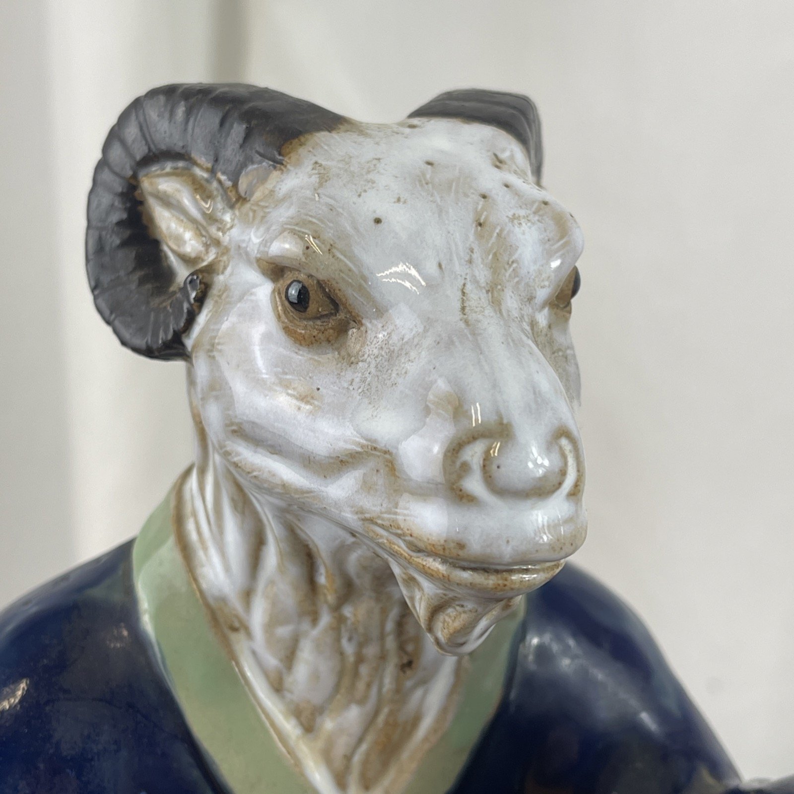 Porcelain chinese goat figurine