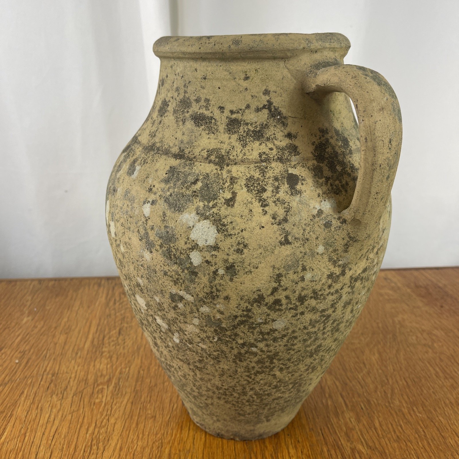 Stoneware pottery jug with handle