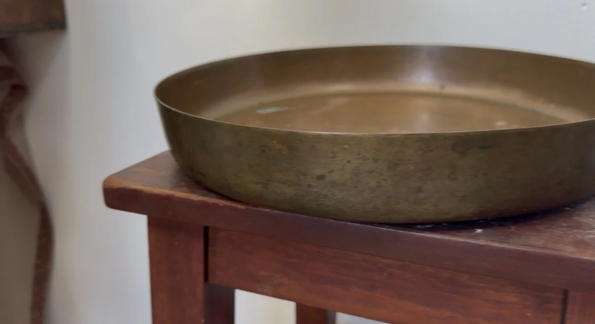 Vintage copper serving bowl with a raised lip edge, found at Kempton Park Antiques Market — perfect as a display bowl for a dining table or kitchen.