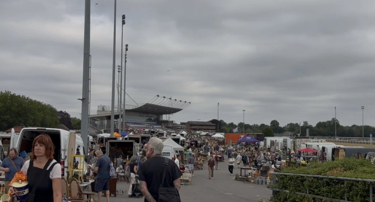 Kempton Race Course Antiques fair stall holders next to the race track selling antiques
