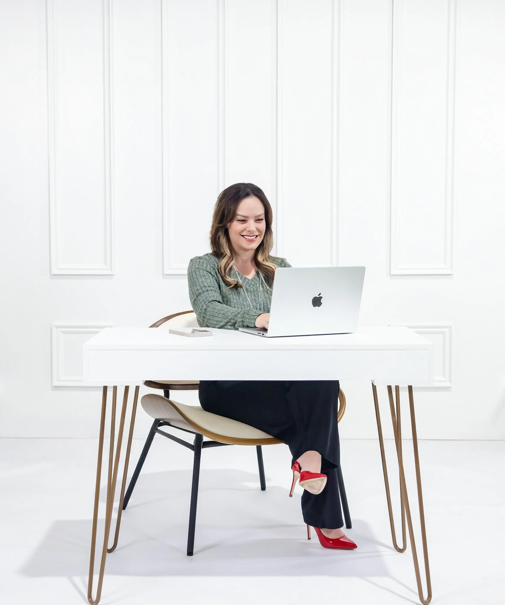 DFW personal branding photography for a professional working at her desk by 38:16 Media