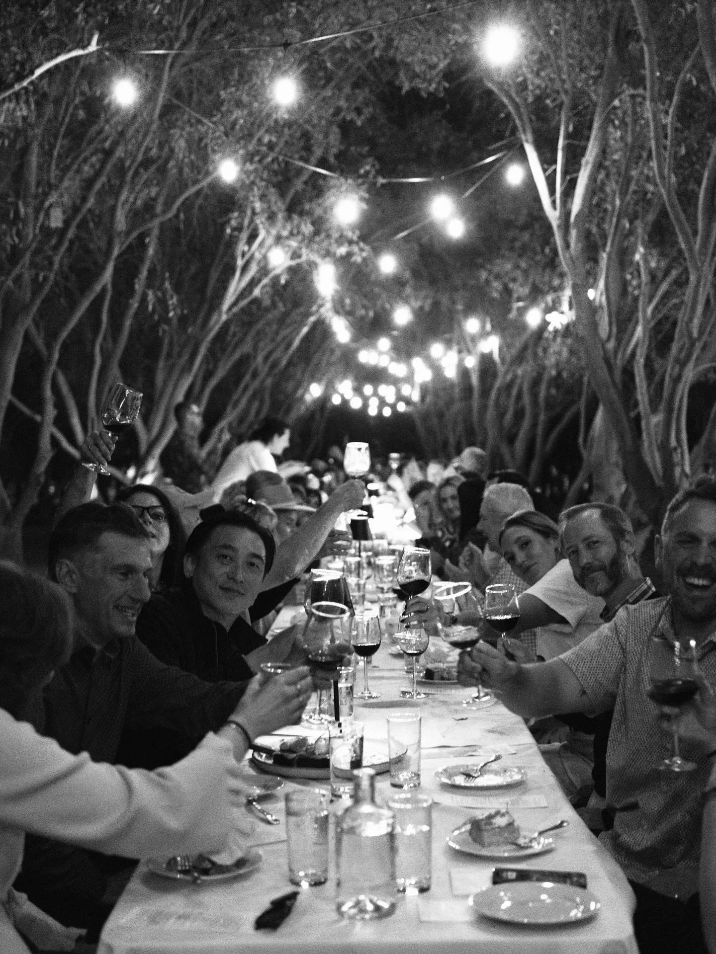 A long table, under an olive grove, on a beautiful summer night. Nothing better than creating an unforgettable atmosphere for the people you love most!! The atmosphere surrounding this photo is something I will always look back on, and feel just as I