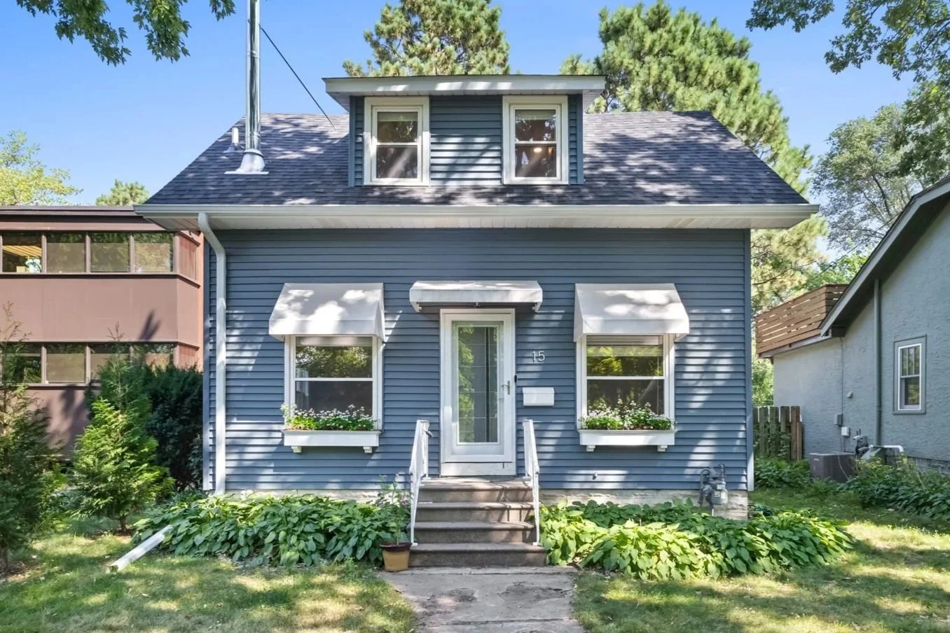 House with blue siding in bryn mawr neighborhood