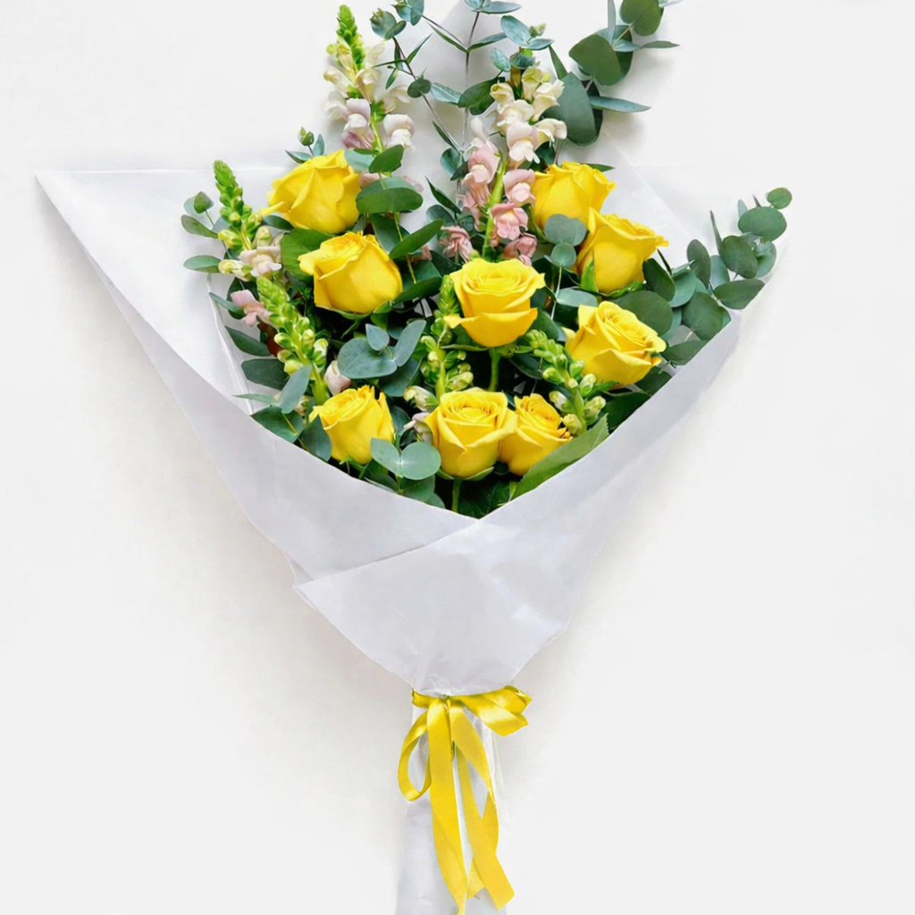 Yellow roses and snapdragons bouquet.png