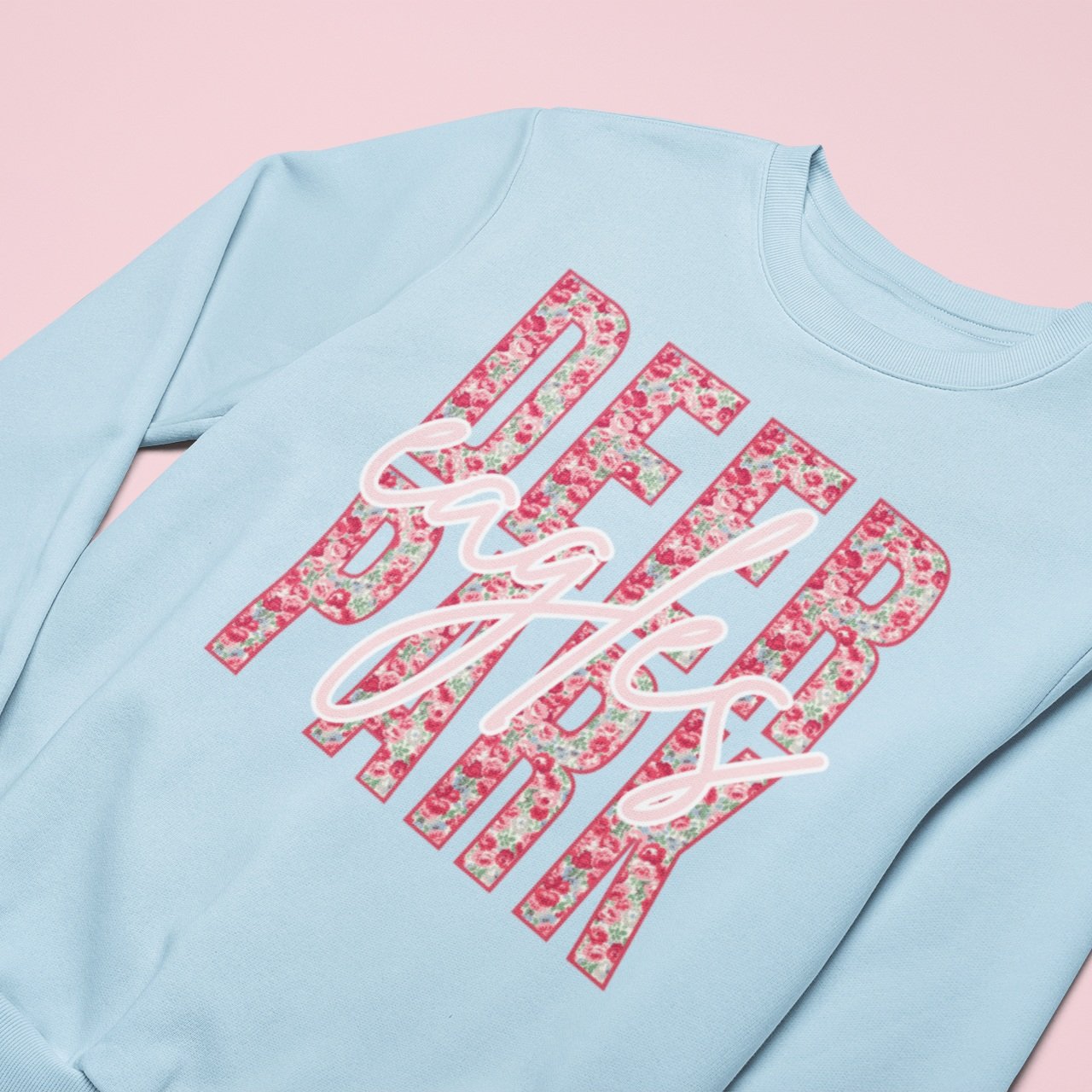 mockup-of-a-customizable-crewneck-sweatshirt-lying-flat-on-a-colored-surface-25564+%285%29.jpg