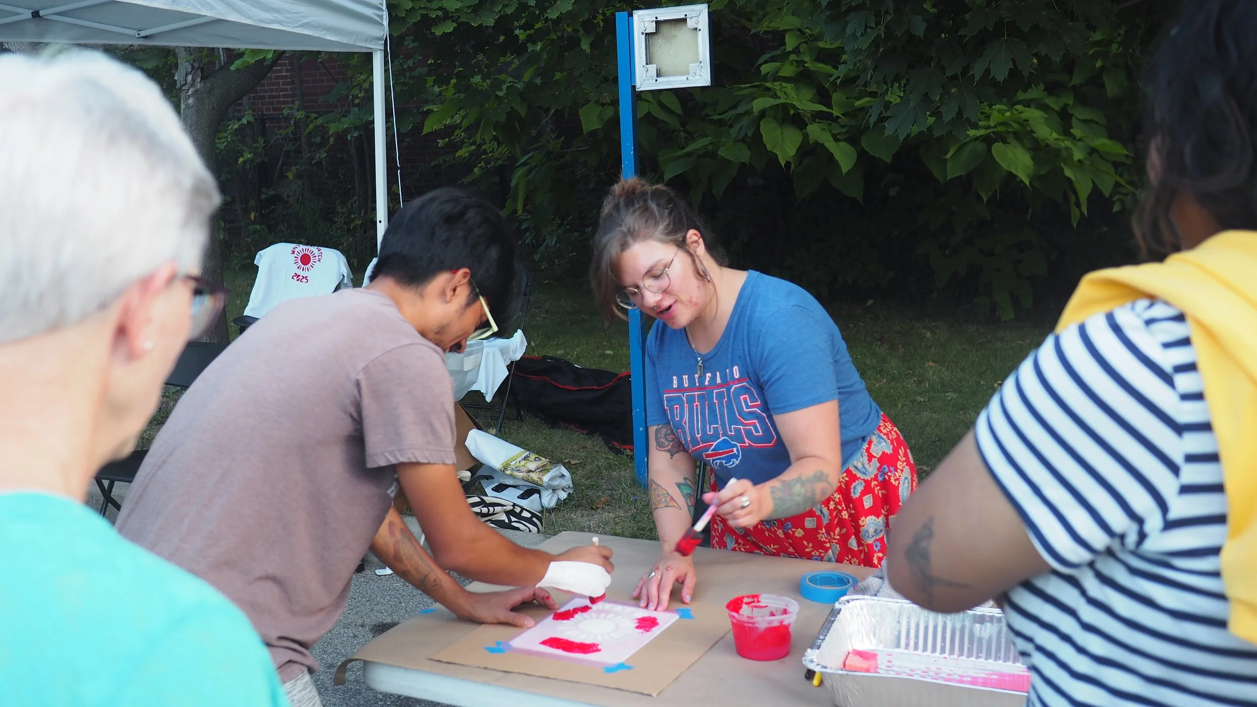 Hillary Bialecki leading screen printing t-shirts for the volunteers. Photo taken by Ruby Wilson. (9).JPG