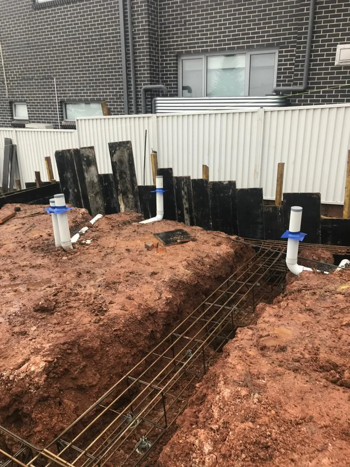 Pre-construction termite barrier system installed around service penetrations before a concrete slab in Sydney