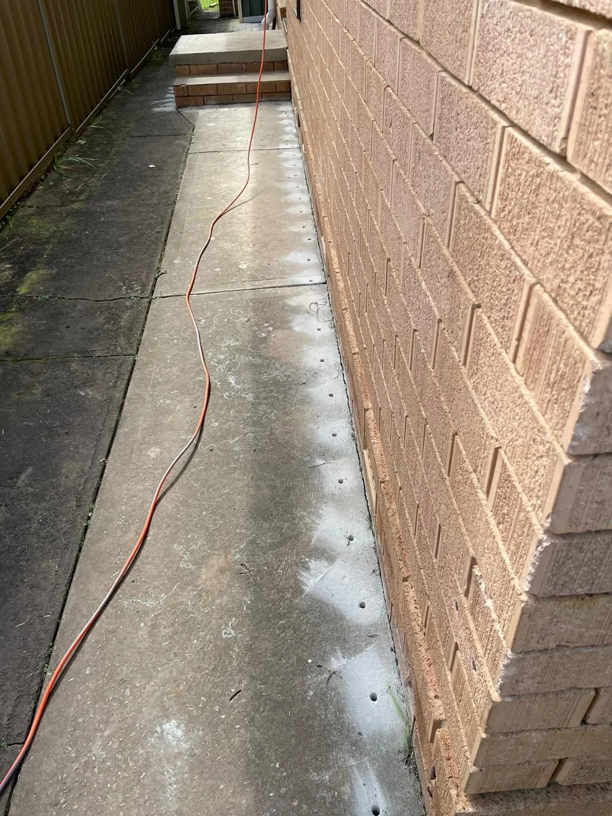 Chemical termite barrier installation around a Sydney home